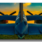 Aircraft: de Havilland Mosquito pointing into the sunset.